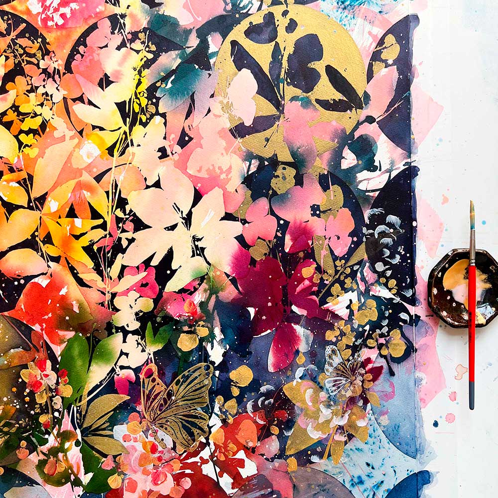 Original watercolor featuring a variety of butterflies camouflaging among leaves and flowers, making it easy to mistake them for their wings. Ingrid Sanchez, original art.