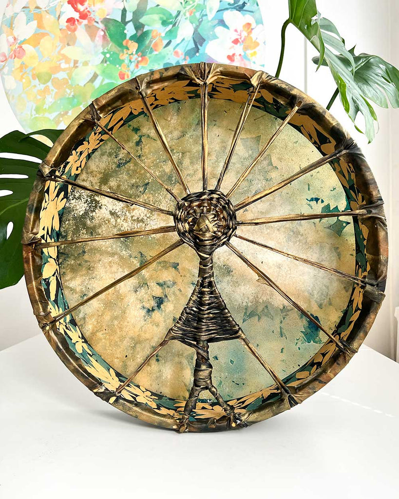 Gaia’s Heartbeat shamanic drum showing woven handle in the shape of a sun goddess figure.