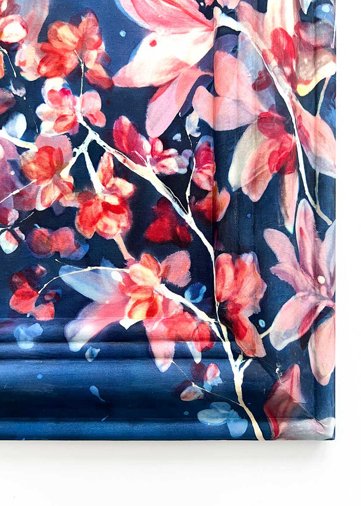 Close-up detail of delicate silk texture and vibrant dye colors on “Midnight Blossoms” silk painting.