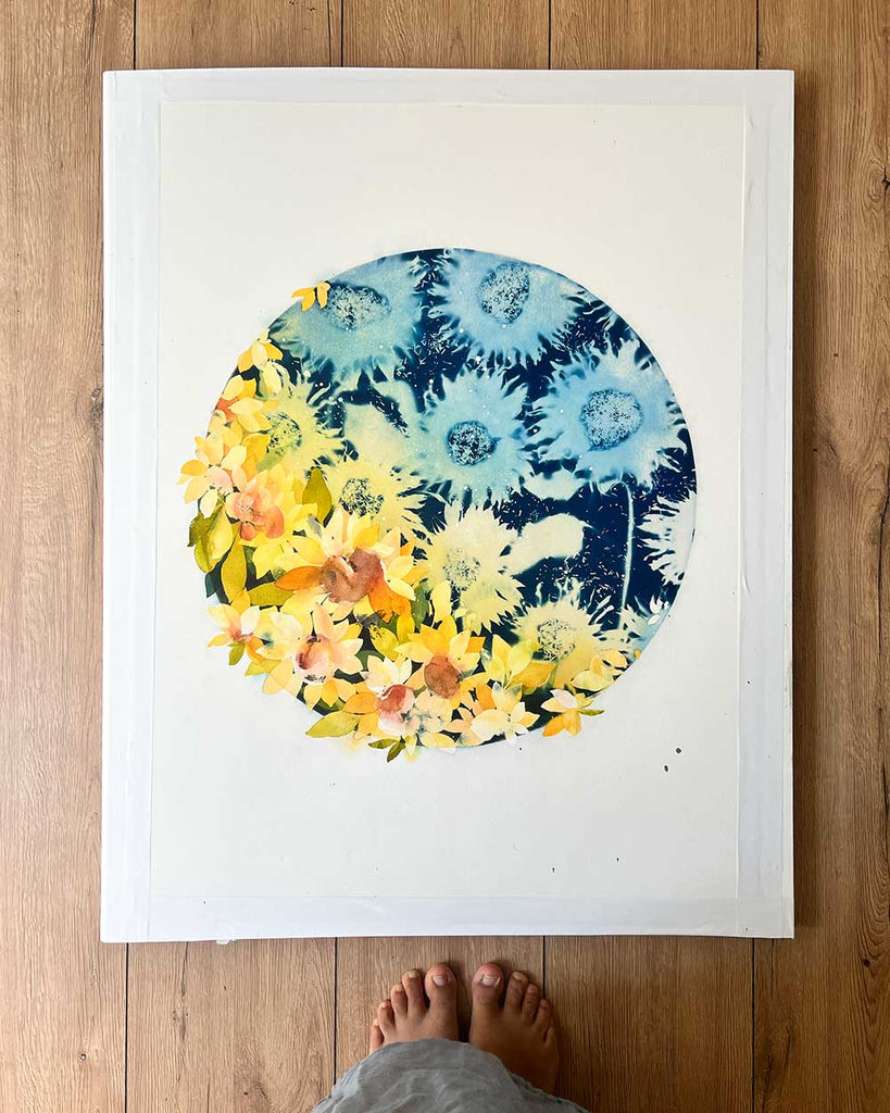 Circular mixed media floral moon artwork with cyanotype bursts and hand-painted blooms.