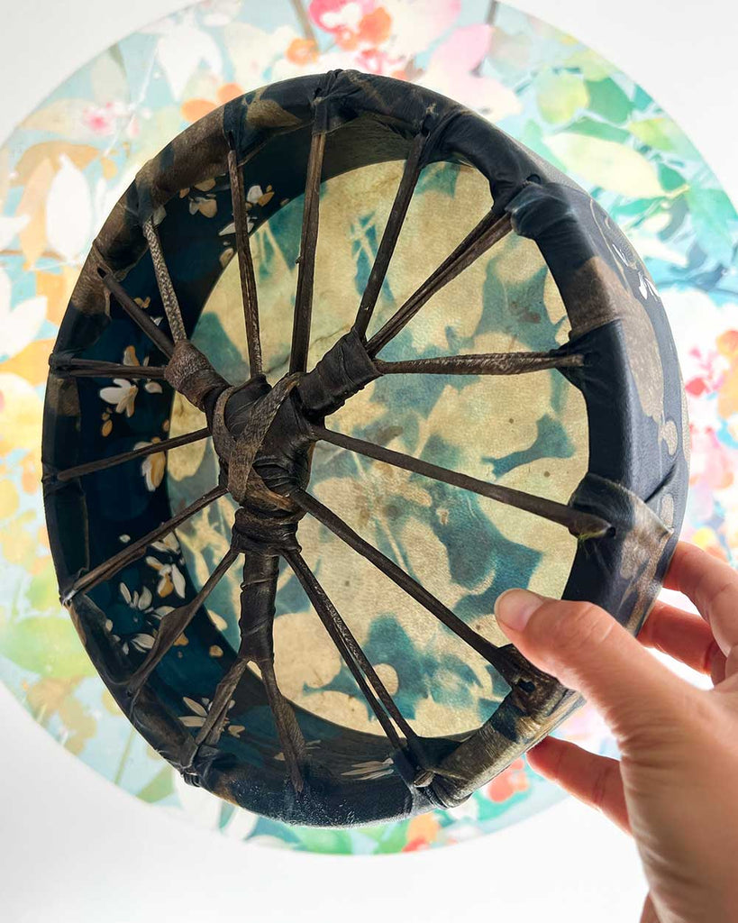 Honeysuckle Dream Spirit shamanic drum with painted deep blue hoop and delicate white and cream honeysuckle flowers, ready for ceremony or meditation.