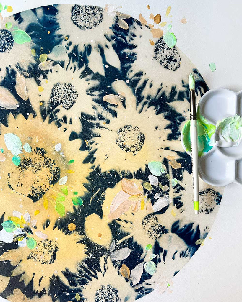 Close-up of textured sunflower cyanotype details with acrylic accents