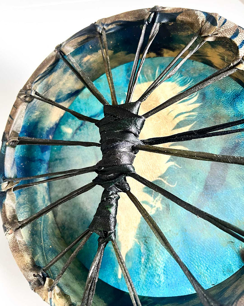 Detail of hand-wrapped handle made from the same blue hide used on the Dreamfeather drum.