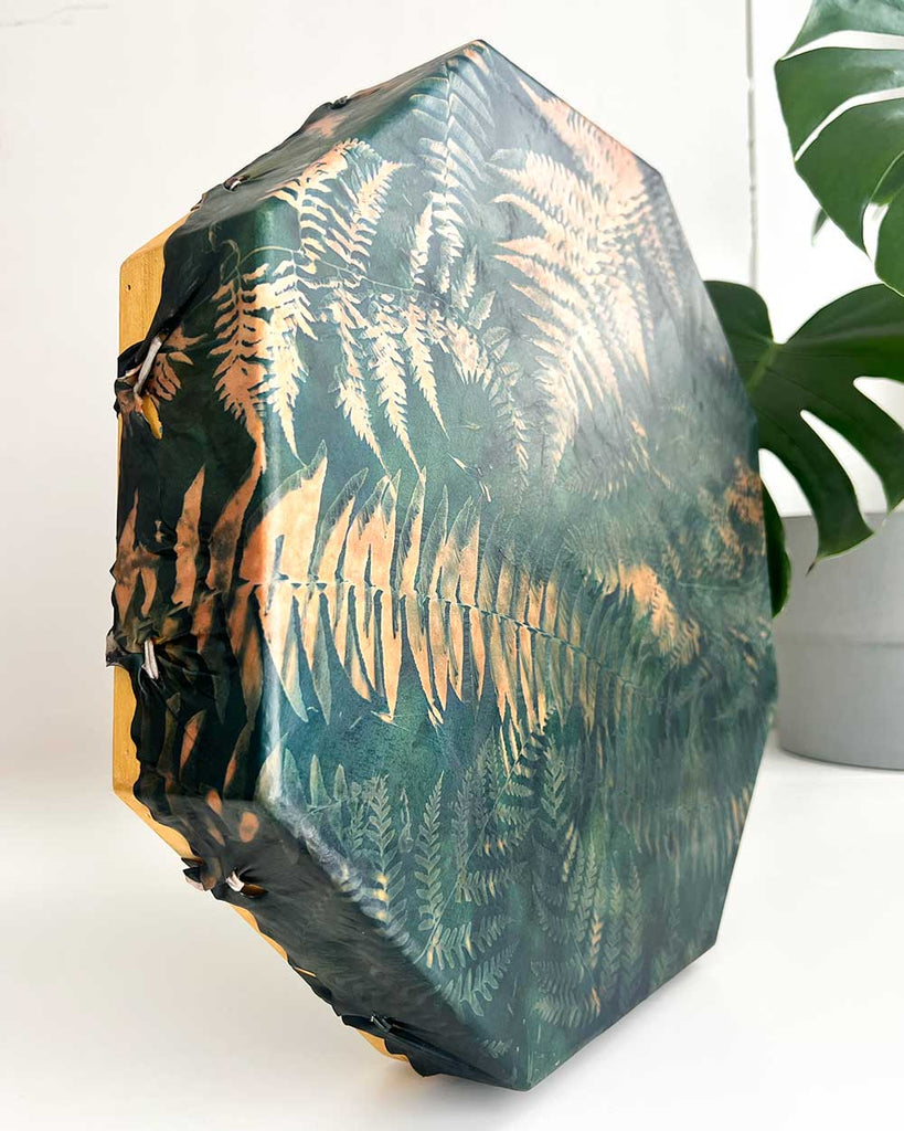 Octagonal shamanic drum made with hand-painted deer hide and floral cyanotype by Ingrid Sanchez