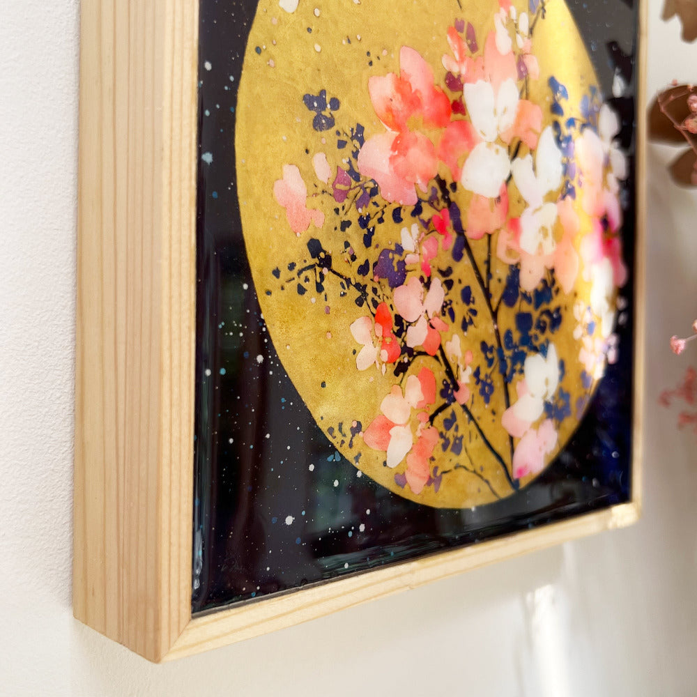 One of a kind! A unique print of 'Floral Sunlight' of a sun with a delicate soft pink floral arrangement against a dreamy, starry blue sky.